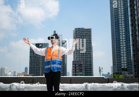 Engineers use VR machines to inspect completed air conditioning and water systems before testing for further work. Stock Photo