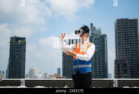 Engineers use VR machines to inspect completed air conditioning and water systems before testing for further work. Stock Photo