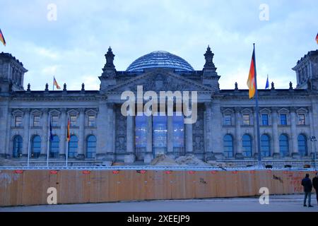 Berlin in Germany - March 13 2024: Reichstag building during the construction of the visitors center on a cloudy day Stock Photo