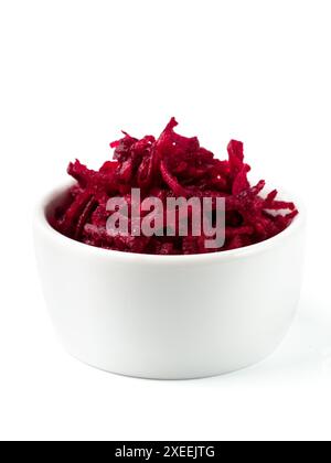 Grated beetroot in ceramic bowl isolated on white Stock Photo