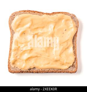 Bread slice with mustard sauce isolated on white Stock Photo