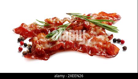 Slices of tasty fried bacon and different spices isolated on white Stock Photo