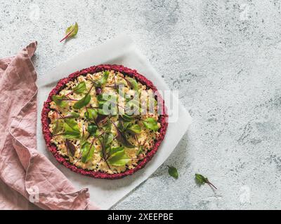 Beetroot pizza crust with fresh mangold leaves Stock Photo