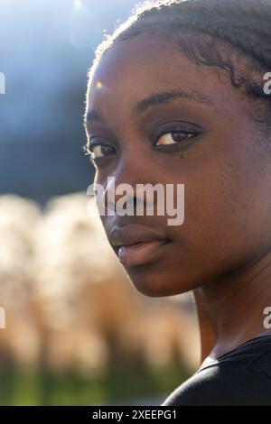 Serene African Woman in Natural Light Stock Photo