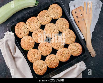 Baking tray with vegetables muffins with zucchini Stock Photo