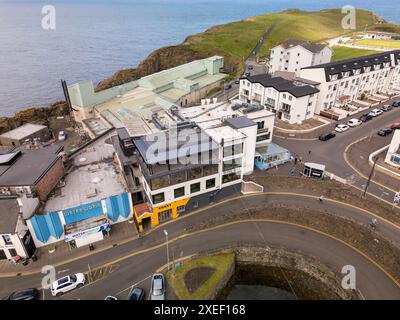 Aerial images of the Ramore Restaurants in Portrush, which offer diverse dining experiences with stunning harbour views, featuring fresh seafood, gourmet dishes, and family-friendly options. Stock Photo