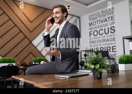 Portrait of a successful lawyer talking on the phone in the office Stock Photo