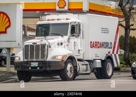 Vancouver, British Columbia, Canada. Apr 12, 2024. A bullet-resistant armored GardaWorld truck, a provider of security services Stock Photo