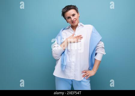 Authentic young trendy dark haired woman in a cool look Stock Photo