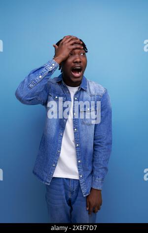 Charismatic stylish african man with black dreadlocks screwed Stock Photo