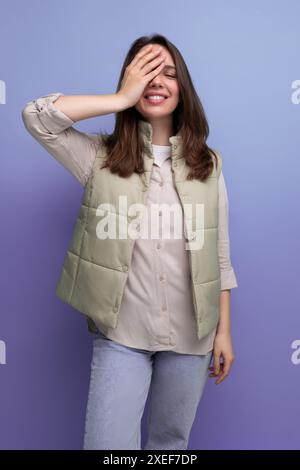 Emotional positive brunette young woman in casual style Stock Photo