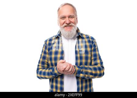 Portrait of a handsome 60s middle aged gray-haired man with a beard in a shirt on a white background Stock Photo