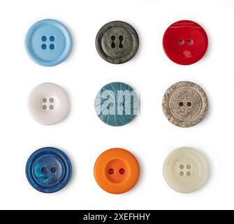 Sewing buttons with a thread Stock Photo