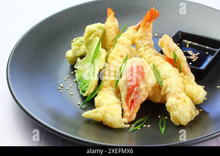 Shrimp tempura placed on a white background. Tempura is a Japanese food. It is Japanese fried shrimp. View from above Stock Photo