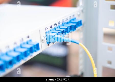 Connector with blue cables. Blur and selective focus Stock Photo