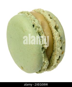 Green pistachio macaron on white isolated background Stock Photo