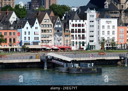 Cologne, Germany June 25 2024: renovated rhine embankment promenade with landing stage of KD Koeln Duesseldorfer Deutsche Rheinschiffahrt GmbH in the Stock Photo