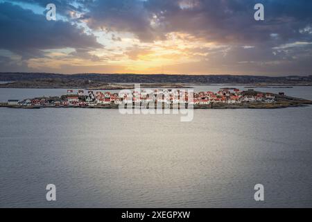 Landscape shot with a view of an island. Astol, RÃ¶nnÃ¤ng, Sweden, with typical Swedish houses Stock Photo