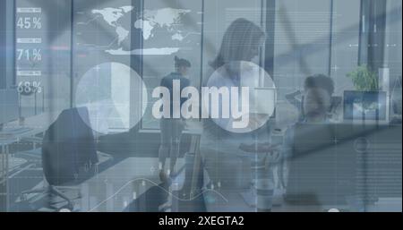 Image of statistical data processing against two diverse women discussing at office Stock Photo