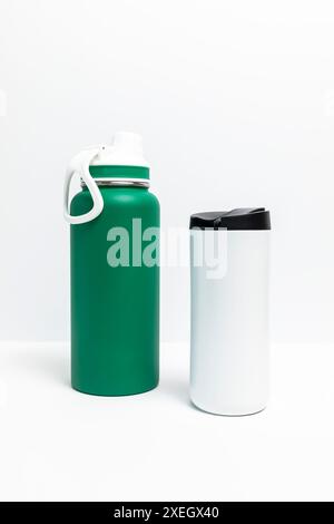 Isolated Reusable Sport Green and Water Bottles, Protein Shaker On White Background. Tumbler, Product Template. Travel Hiking Mug Vertical Plane. Stock Photo