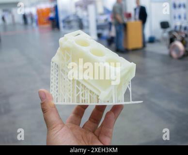 Detailed models in form of internal combustion engine printed on 3D printer from polymer close-up. Detailed object created by 3D printer using 3D printing method. Concept 3D Printing. SLA technology Stock Photo