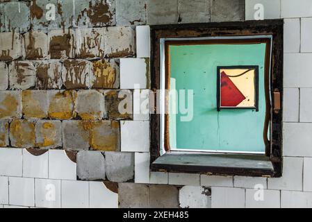 Colorful Window Opening On Grunge Rusty Concrete Wall With Old Broken White Square Tiles Stock Photo