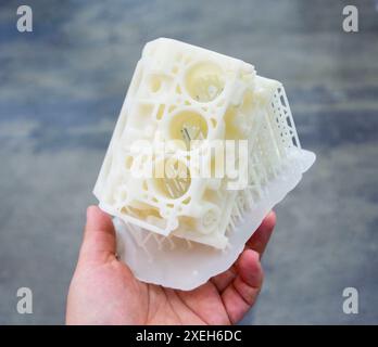 Detailed models in form of internal combustion engine printed on 3D printer from polymer close-up. Detailed object created by 3D printer using 3D printing method. Concept 3D Printing. SLA technology Stock Photo