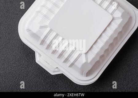 Square plastic or cardboard container of white color for food Stock Photo