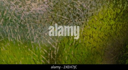 Green rough abstract background with strokes, color gradient, texture, grainy noise. Stock Photo