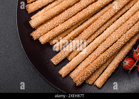 Delicious fresh grissini sticks with salt and sesame seeds Stock Photo