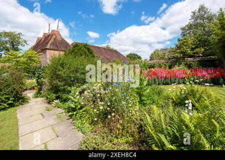 Oast house at Great Dixter, East Sussex, UK Stock Photo
