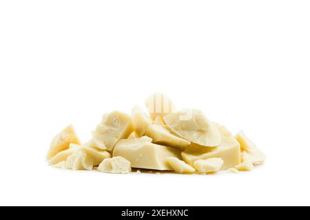 Pile of white chocolate flakes isolated on white background. Stock Photo