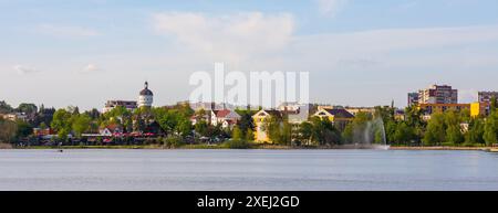 Elk, Poland - May 3, 2024: Panoramic view of Elk town with historic city center and waterfront promenade at Jezioro Elckie Lake in Mazuria lakeland Stock Photo