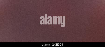 Grainy, textural gradient background fading from deep burgundy to black Stock Photo