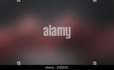Subtle red to black gradient background with a moody, grainy texture Stock Photo