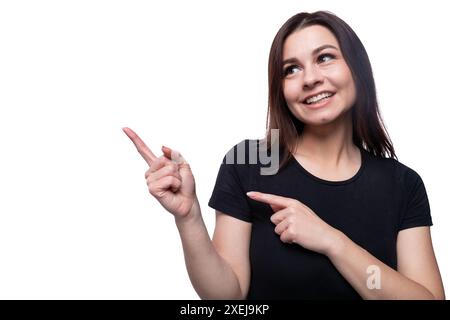 Pretty young woman in a black T-shirt on a white clean background Stock Photo