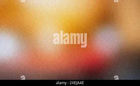 Smooth gradient of warm colors on an abstract grainy background Stock Photo