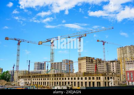 Panorama view large construction sites and many cranes are working in the, Industry new building residential complex Stock Photo