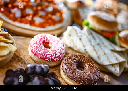 Foods enhancing the risk of cancer. Junk food. Stock Photo