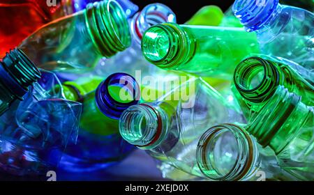 Empty colored drink bottles. Recyclable plastic waste. Stock Photo