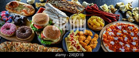 Foods enhancing the risk of cancer. Junk food. Stock Photo