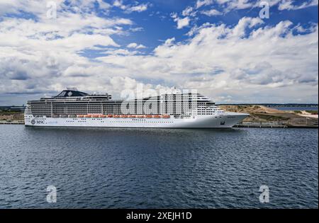 MSC Fantasia cruise ship docked at the Oceankaj Cruise pier in Copenhagen Denmark. The ship is a part of a partnership with UNICEF and MSC Cruises Stock Photo