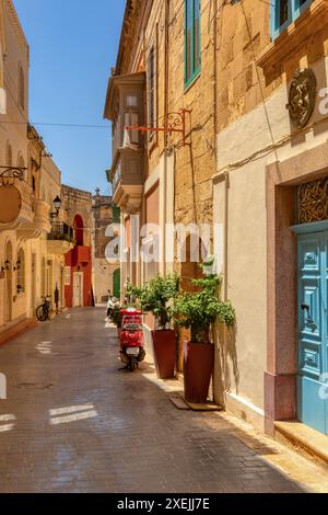 One of the small historic hidden streets in ancient city Victoria. Gozo Malta Stock Photo