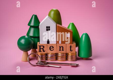 Small wooden house and the inscription for rent. Concept for sale, rental of real estate for a family Stock Photo