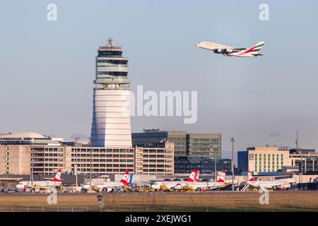 Vienna Schwechat airport with lots of airplanes in the air and on the ground Stock Photo