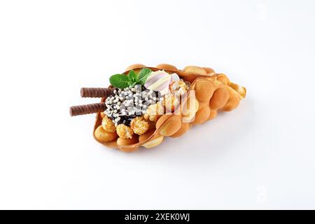 Delicious sweet bubble waffle on white background Stock Photo