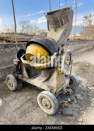 Rustic Concrete Mixer on Construction Site Stock Photo