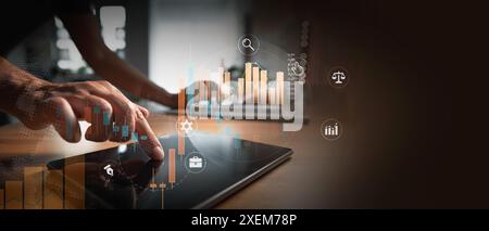 Businessman using tablet. Business and finance charts concept Stock Photo