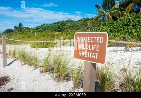 A marker indicating the location of a sea turtle nest site on the beach in Sanibel, Florida Stock Photo