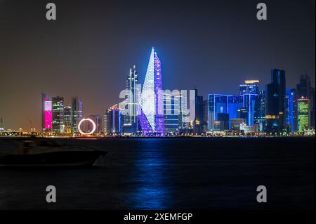 Skyline of Doha at night, Qatar Stock Photo